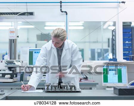 Female engineer inspecting artificial hip joint parts in quality control department in orthopaedic factory View Large Photo Image Stock Photo - Female engineer inspecting artificial hip joint parts in quality control department in orthopaedic factory. Fotosearch