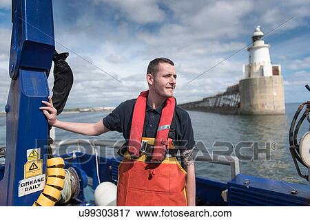 Stock Photo - Fisherman on research ship. Fotosearch