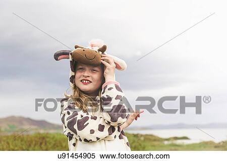 Girl wearing animal onesie with arms folded, Thingvellir, Iceland View Large Photo Image Stock Photography - Girl wearing animal onesie with arms folded, Thingvellir, Iceland. Fotosearch