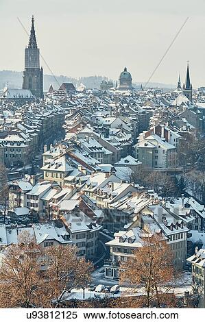 High angle view of city and skyline with snow covered rooftops, Berne, Switzerland View Large Photo Image Stock Photography - High angle view of city and skyline with snow covered rooftops, Berne, Switzerland. Fotosearch