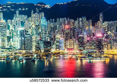 Hong Kong island and skyline, illuminated at night, Hong Kong, China View Large Photo Image Stock Image - Hong Kong island and skyline, illuminated at night, Hong Kong, China. Fotosearch