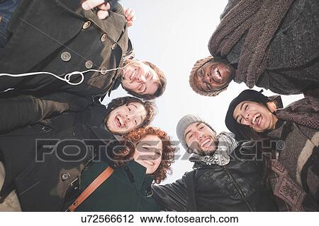 Low angle portrait of six young adult friends View Large Photo Image Stock Image - Low angle portrait of six young adult friends. Fotosearch