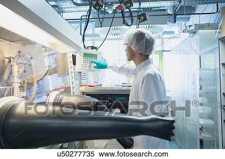 Male scientist adjusting switch for fume hood in lab cleanroom View Large Photo Image Stock Photography - Male scientist adjusting switch for fume hood in lab cleanroom. Fotosearch