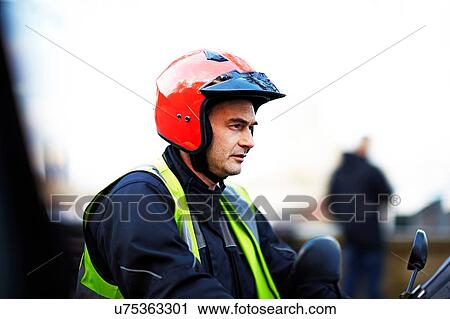 Motor scooter rider on the move in city View Large Photo Image Stock Image - Motor scooter rider on the move in city. Fotosearch