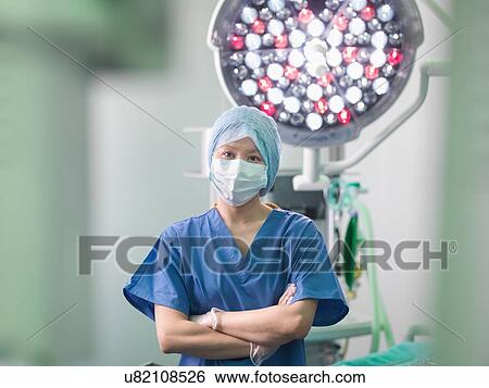 Orthopaedic nurse in operating theatre, portrait View Large Photo Image Stock Photograph - Orthopaedic nurse in operating theatre, portrait. Fotosearch
