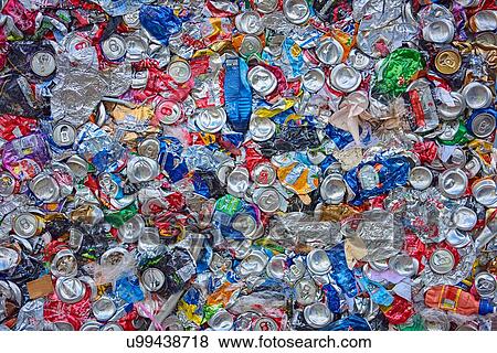 Stock Photo - Overhead view of flattened waste aluminium and plastic packaging. Fotosearch
