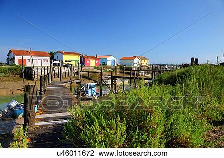 Stock Image - Oyster beds, Cite de l'Huitre, marennes, Poitou-Charentes, France. Fotosearch