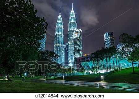 Picture - Petronas Towers illuminated at night, Kuala Lumpur, Malaysia. Fotosearch