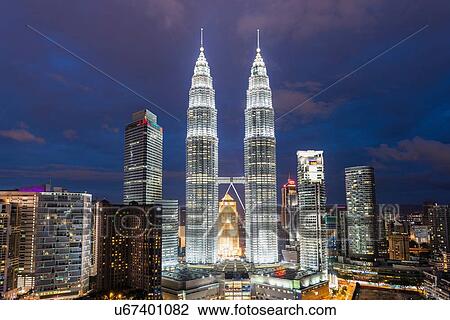 Petronas Towers illuminated at night, Kuala Lumpur, Malaysia View Large Photo Image Stock Image - Petronas Towers illuminated at night, Kuala Lumpur, Malaysia. Fotosearch