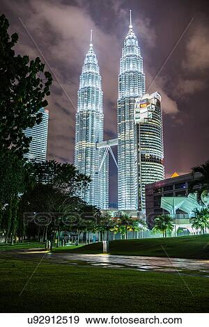 Stock Photo - Petronas Towers illuminated at night, Kuala Lumpur, Malaysia. Fotosearch