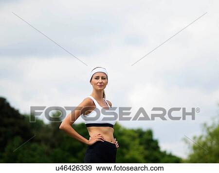 Portrait of woman in sports top View Large Photo Image Stock Photo - Portrait of woman in sports top. Fotosearch