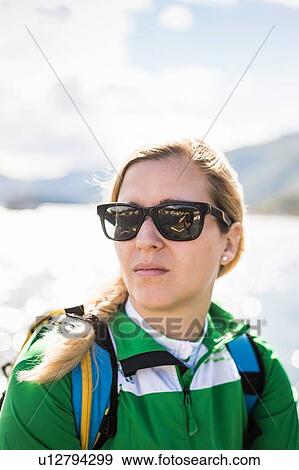 Stock Photo - Portrait of young woman, Lake Como, Italy. Fotosearch