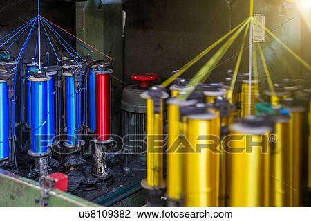 Stock Image - Rope production in factory that makes products for boating and camping. Fotosearch