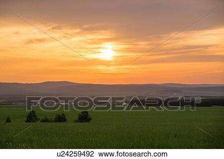 Stock Image - Rural scene, at sunset, Sarsy, Sverdlovsk region, Russia. Fotosearch