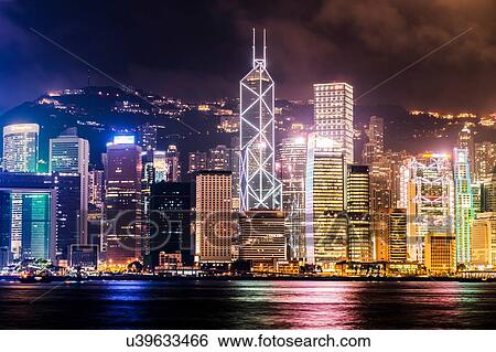 Stock Photograph - Skyline at night. Hong Kong, China. Fotosearch