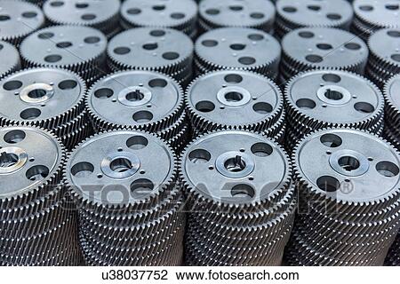 Steel gear wheels in production in engineering factory View Large Photo Image Stock Image - Steel gear wheels in production in engineering factory. Fotosearch