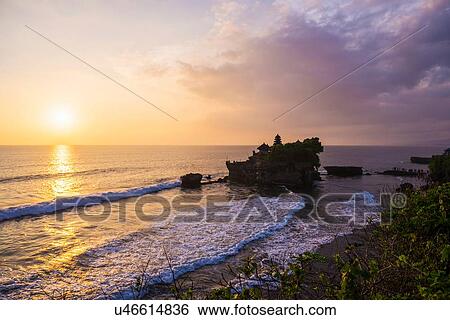 Tanah Lot temple at sunset, Bali, Indonesia View Large Photo Image Stock Photograph - Tanah Lot temple at sunset, Bali, Indonesia. Fotosearch