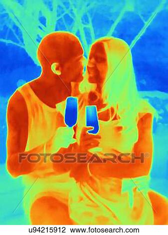 Thermal photograph of romantic young couple drinking wine View Large Photo Image Stock Image - Thermal photograph of romantic young couple drinking wine. Fotosearch