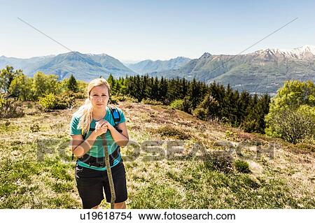 Young woman, hiking, Lake Como, Italy View Large Photo Image Picture - Young woman, hiking, Lake Como, Italy. Fotosearch
