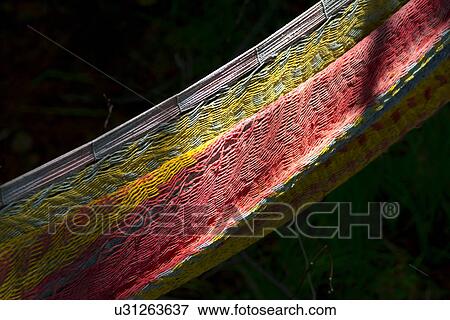 Close-up of a hammock, Lake of the Woods, Ontario, Canada View Large Photo Image Stock Photo - Close-up of a hammock, Lake of the Woods, Ontario, Canada. Fotosearch