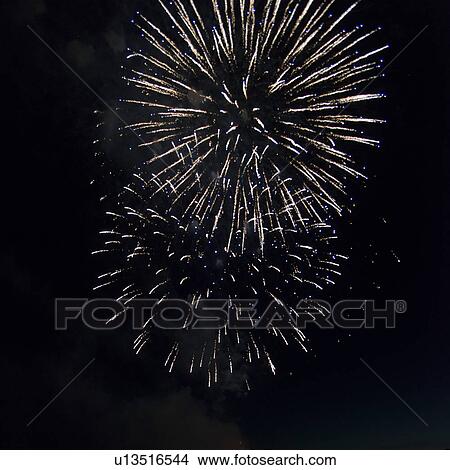 Fireworks display at night on Canada Day, Kenora, Lake Of The Woods, Ontario, Canada View Large Photo Image Picture - Fireworks display at night on Canada Day, Kenora, Lake Of The Woods, Ontario, Canada. Fotosearch