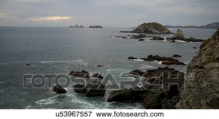 Stock Photo - High angle view of rocky coast, Zihuatanejo, Guerrero, Mexico. Fotosearch
