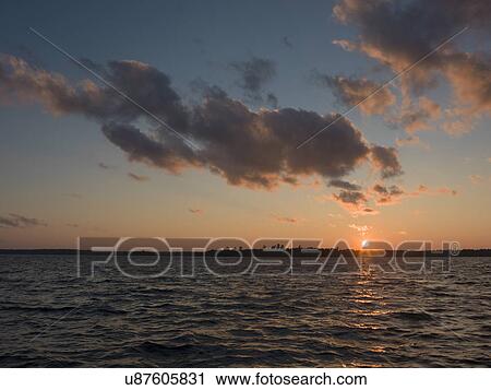 Lake at sunset, Lake Of The Woods, Ontario, Canada View Large Photo Image Stock Image - Lake at sunset, Lake Of The Woods, Ontario, Canada. Fotosearch