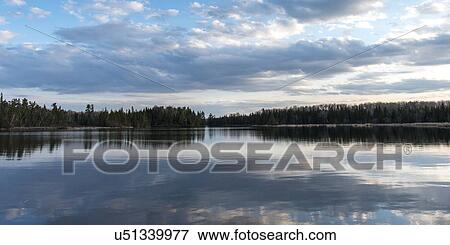 Reflection of clouds on water, Lake Of The Woods, Ontario, Canada View Large Photo Image Stock Photo - Reflection of clouds on water, Lake Of The Woods, Ontario, Canada. Fotosearch