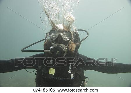 Stock Photography - Underwater view of a scuba diver, Ixtapa, Guerrero, Mexico. Fotosearch