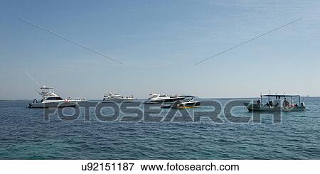 Stock Photo - View of boats at sea, Zihuatanejo, Guerrero, Mexico. Fotosearch