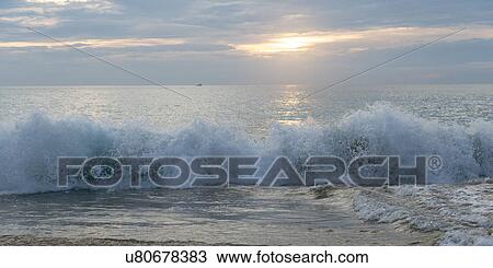View of waves breaking on beach, Zihuatanejo, Guerrero, Mexico View Large Photo Image Stock Image - View of waves breaking on beach, Zihuatanejo, Guerrero, Mexico. Fotosearch