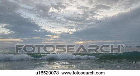 Stock Photo - View of waves on beach, Zihuatanejo, Guerrero, Mexico. Fotosearch