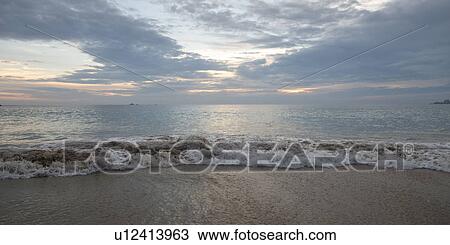 View of waves on the beach, Zihuatanejo, Guerrero, Mexico View Large Photo Image Stock Image - View of waves on the beach, Zihuatanejo, Guerrero, Mexico. Fotosearch