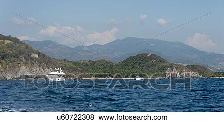 View of yachts along coast, Zihuatanejo, Guerrero, Mexico View Large Photo Image Stock Photo - View of yachts along coast, Zihuatanejo, Guerrero, Mexico. Fotosearch