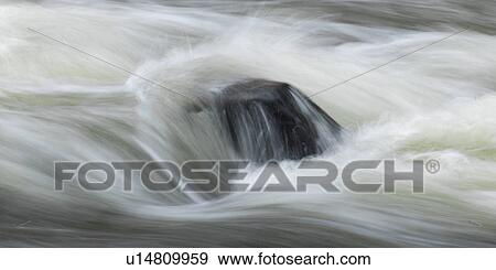 Stock Photo - Water flowing through rocks, Rushing River Provincial Park, Ontario, Canada. Fotosearch
