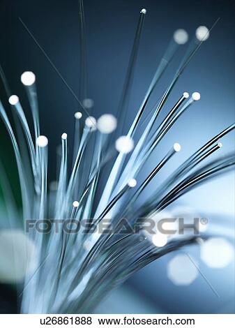 Bundles of illuminated optical fibres used to carry high volumes of data View Large Photo Image Stock Photo - Bundles of illuminated optical fibres used to carry high volumes of data. Fotosearch