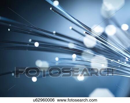 Stock Photograph - Bundles of illuminated optical fibres used to carry high volumes of data. Fotosearch