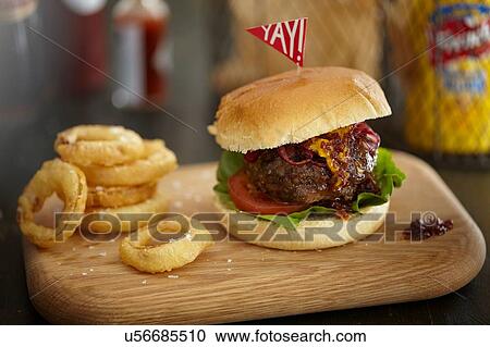 Burger and onion rings View Large Photo Image Stock Image - Burger and onion rings. Fotosearch