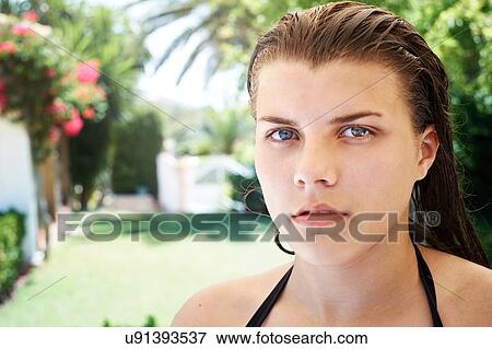 Stock Photo - Close up portrait of teenage girl with wet hair. Fotosearch