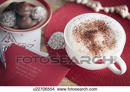 "Coffee, Invitation card and coconut-coated chocolate" View Large Photo Image Picture - "Coffee, Invitation card and coconut-coated chocolate". Fotosearch