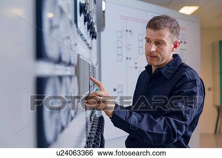 Engineer using control panel at geothermal power station View Large Photo Image Stock Photograph - Engineer using control panel at geothermal power station. Fotosearch