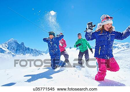 "Family having snowball fight, Chamonix, France" View Large Photo Image Stock Photography - "Family having snowball fight, Chamonix, France". Fotosearch