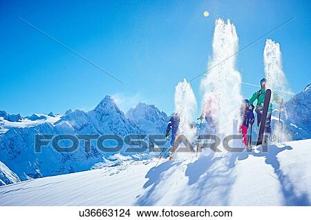 Picture - "Family on ski trip, Chamonix, France". Fotosearch