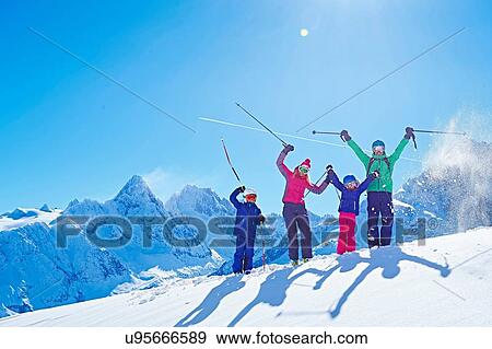 Stock Photo - "Family on ski trip, Chamonix, France". Fotosearch
