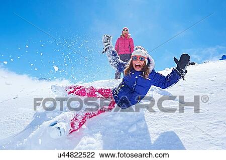 "Girl falling into snow, Chamonix, France" View Large Photo Image Stock Image - "Girl falling into snow, Chamonix, France". Fotosearch