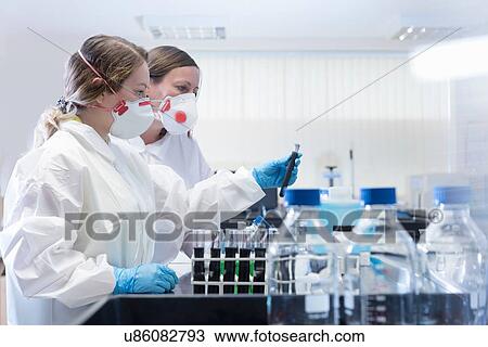 Stock Image - Graphene sample quality control in graphene processing factory. Fotosearch