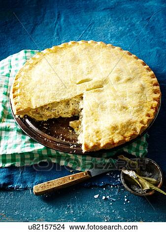 "High angle view of lemon myrtle chicken pie, slice missing" View Large Photo Image Picture - "High angle view of lemon myrtle chicken pie, slice missing". Fotosearch