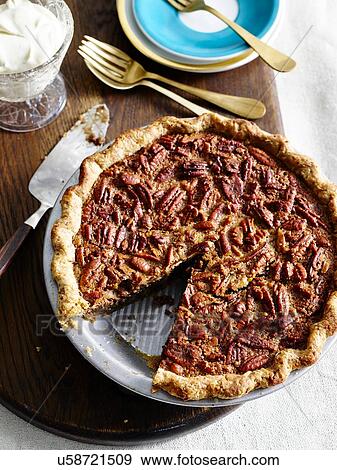 High angle view of pecan pie with slice missing View Large Photo Image Stock Photo - High angle view of pecan pie with slice missing. Fotosearch