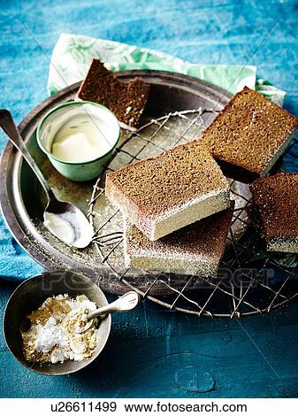 High angle view of sliced Jamacian ginger cake View Large Photo Image Stock Photo - High angle view of sliced Jamacian ginger cake. Fotosearch
