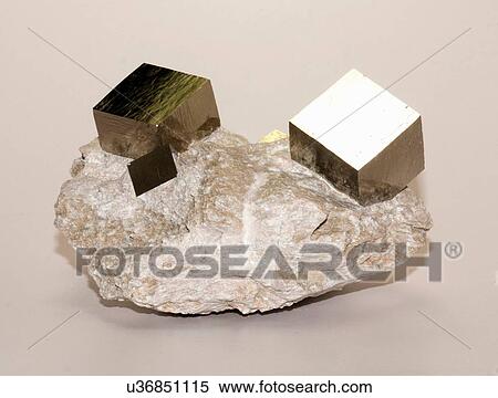 Stock Photography - "Iron pyrite cubic crystals in matrix, collected at Mina Victoria, Navajun La Rioja, Spain". Fotosearch